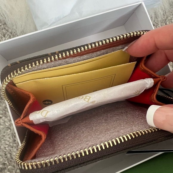 The Dooney & Bourke Greta Large Zip Around Credit Card Case - Picture 6 of 14